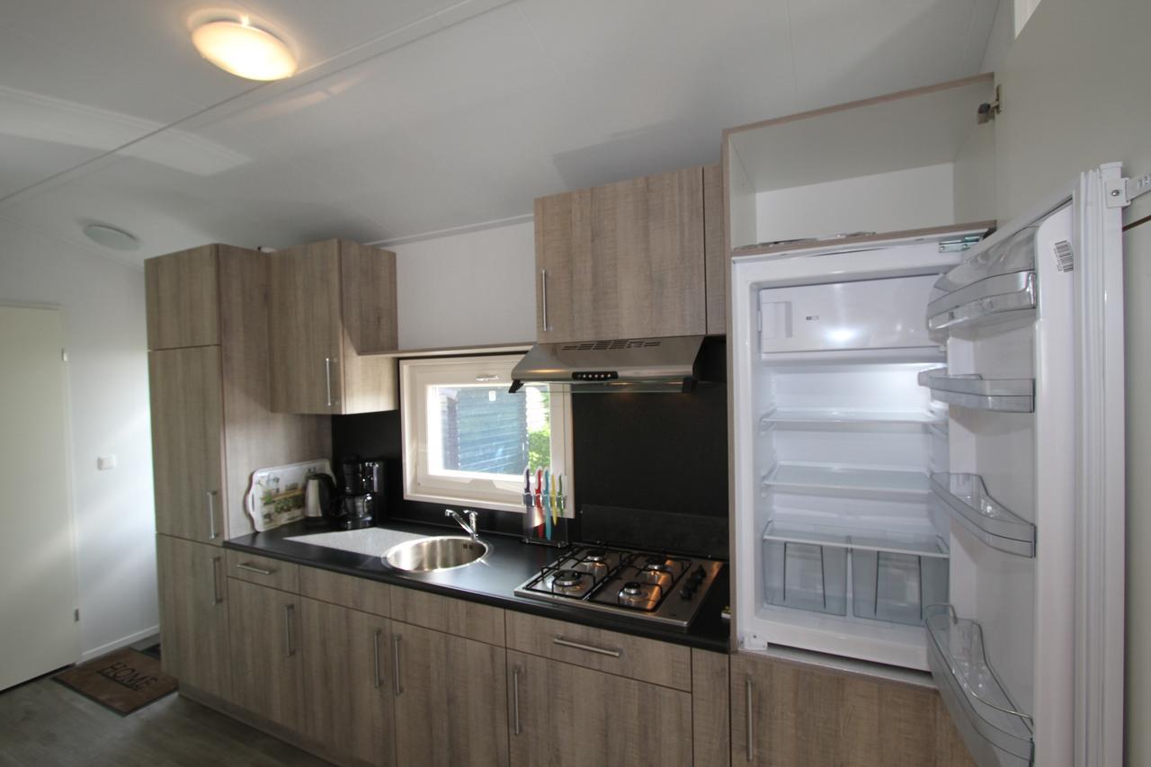 Ijsselmeer-Chalet Nr. 66 Molkwerum ภายนอก รูปภาพ